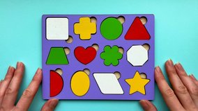 Video how an educational toy consisting of geometric shapes is disassembled. Childrens development, toys.

