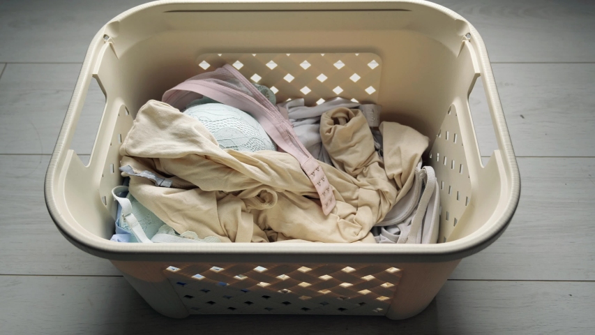 Laundry. Basket for dirty white Laundry, the preparation for a big wash