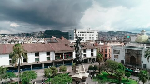Quito, Ecuador 10-10-2019: Old town, Plaza Grande and Metropolitan Cathedral, aerial shot of square park with churches. 