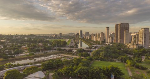 Aerial Hyperlapse along the river with busy traffic on late afternoon over Marginal Pinheiros in Sao Paulo Brazil
