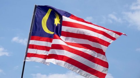 Real Malaysia Flag Waving On Blue Stock Footage Video (100% Royalty ...