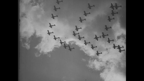 CIRCA 1938 - The German army is seen marching and the Luftwaffe is seen in flight.