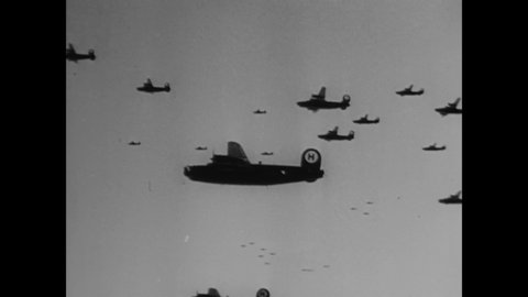 CIRCA 1945 - Aerial combat footage shows the RAF and US Army Air Force attacking Nazi Germany, and American soldiers fire artillery at the Nazis.