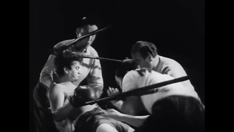 CIRCA 1941 - One of the East Side Kids (Leo Gorcey) is almost knocked out in a boxing match.