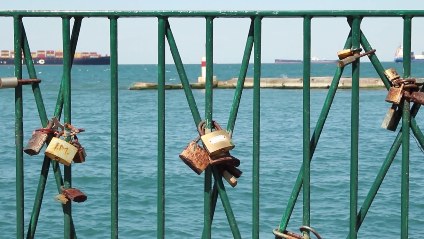 Urban coast with metal railings with locks, Thessaloniki Greece