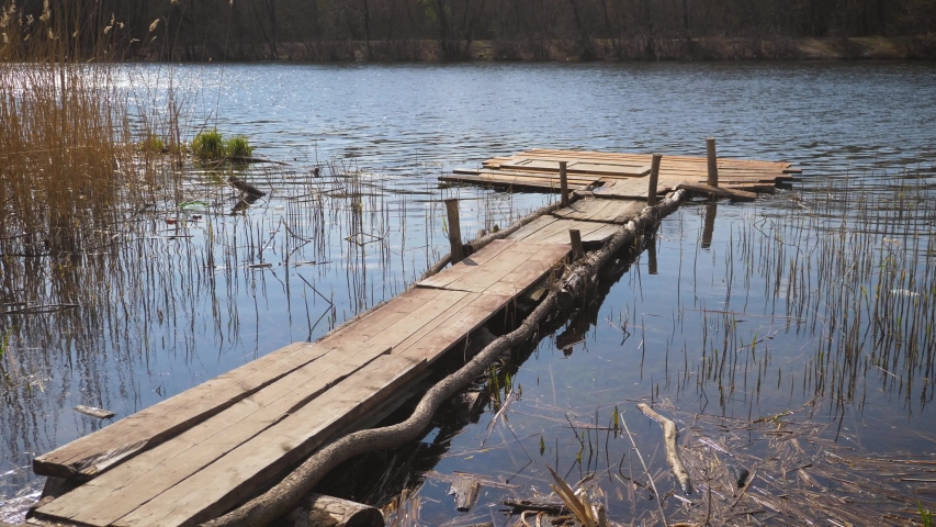 Old wooden pier on the lake
