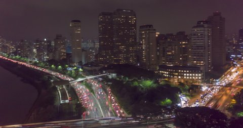 Aerial hyperlapse of Marginal Pinheiros at night with heavy traffic in Sao Paulo