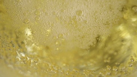 Abstract champagne with bubbles, close up