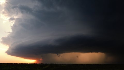 A Large Supercell Thunderstorm Spirals Across Tornado Alley During A Severe Weather Outbreak