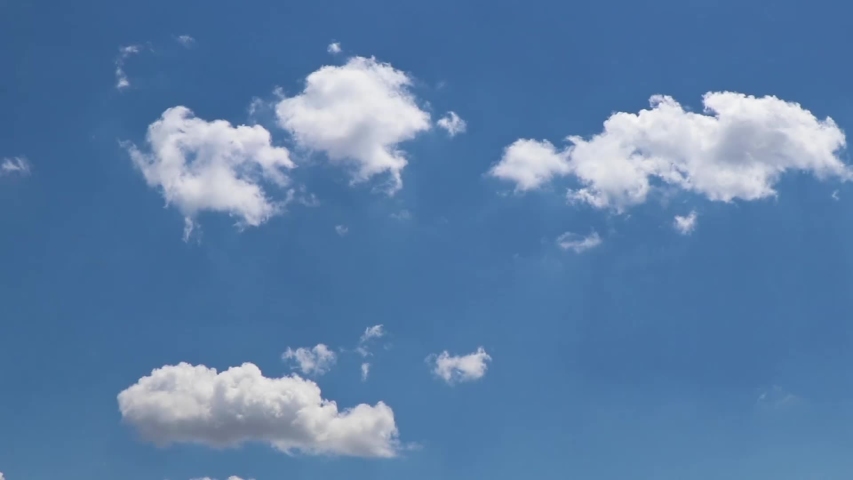 Open sky cloud mass cotton clouds background blue outdoor moving cloud cluster swirling upward. Cloud moving and transforming fast in deep clear blue sky over land with. Time lapse cloud beautiful sky Royalty-Free Stock Footage #1052696573