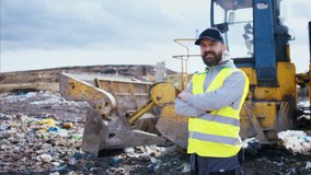Front view of worker on landfill, waste management and environmental concept. - Powered by Shutterstock - Get 15% off with code: PIKWIZARD15