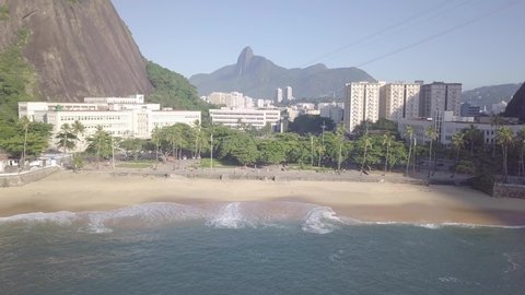 Aerial view of Praia Vermelha, Urca, Rio de Janeiro with Cristo Redentor in the background 