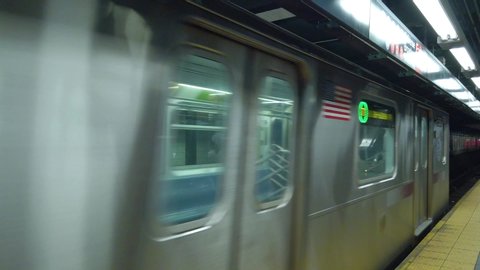New York City / United States - 06 13 2019: New York City Subway number seven leaving Times Square Station, Manhattan, New York, USA - June 2019