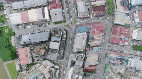 Kuching, Sarawak, Malaysia | June 2018 | Top down aerial drone video of Kuching town centre with cars.