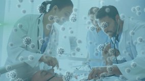 Animation of macro Covid-19 cells floating, a graph showing the curve flattening over three doctors examining a patient. Coronavirus Covid-19 pandemic concept digital composite - Powered by Shutterstock - Get 15% off with code: PIKWIZARD15