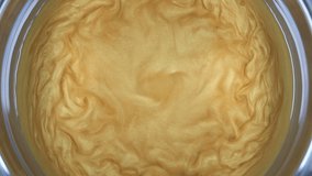 Powder in the water. Magical whirlpools. Unusual hydrodynamic effect. 50 fps HD - Powered by Shutterstock - Get 15% off with code: PIKWIZARD15