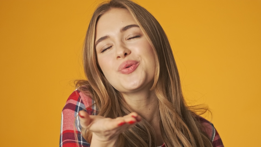 Blowing a kiss. Blowing a kiss