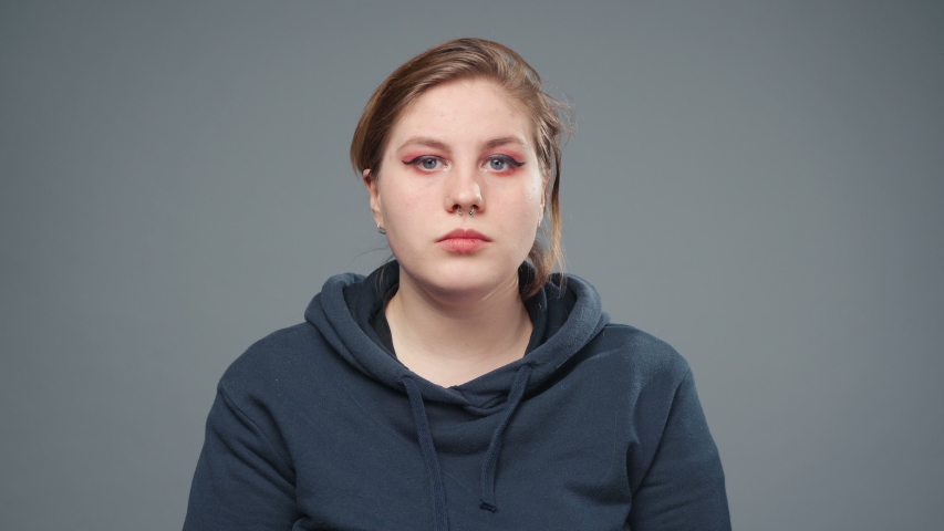 Video of flirting stout woman, closeup