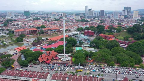 Aerial Orbiting Parallax Taming Sari Tower Malacca Malaysia Bandar Hilir With Melaka River View And Giant Ship Maritime Museum 4K Cinematic Drone Footage