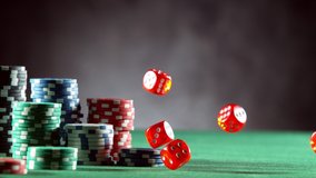 Super slow motion of rolling red dices on poker table. Filmed on high speed cinema camera, 1000fps. - Powered by Shutterstock - Get 15% off with code: PIKWIZARD15