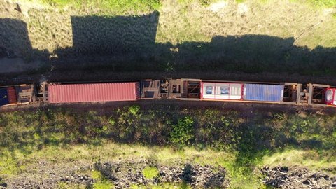 Aerial view fo cargo train in forest