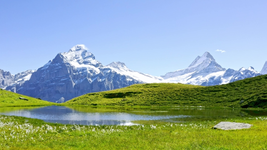 Mountains and lake in Switzerland: from First to Grindelwald, Bernese Oberland Royalty-Free Stock Footage #1052774669