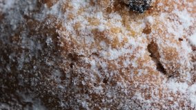 Grocery background rotating sweet raisin muffin close-up macro video clip