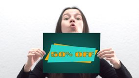 Woman showing 50 percent label sign, sale concept