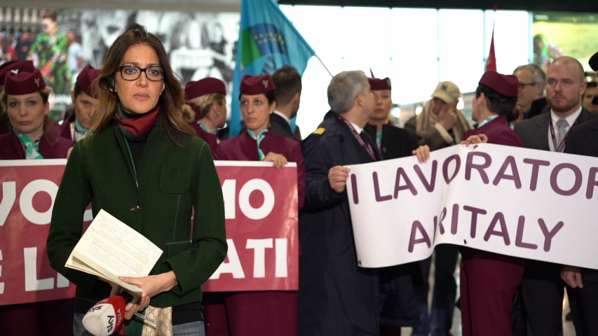 Milan / Italy - 02 17 2020: Air Italy workers in uniform manifest against airline dismissals. Milan | Shutterstock HD Video #1052826047