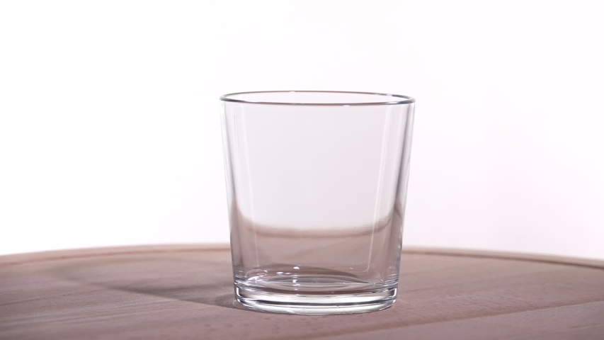 Throw a pop tablet into a glass and pour water. Slow motion 250fps