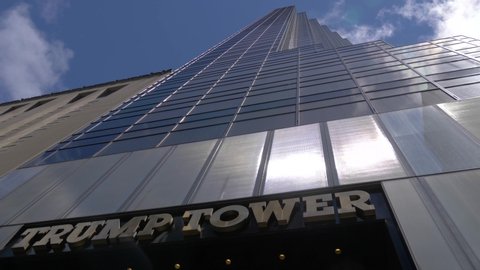 New York / United States - 06 14 2019: Trump Tower filmed from below at Fifth Avenue, New York City