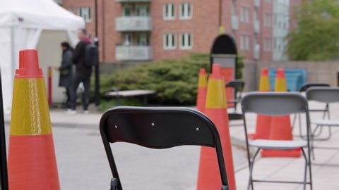 STOCKHOLM, SWEDEN - MAY 18, 2020: Chair for maintaining social distance outside health centre during covid-19