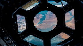 The Sinai Peninsula with the Gulf of Aqaba and the Gulf of Suez as seen from the Window or Cupola of the International Space Station. Elements of this Video furnished by NASA.