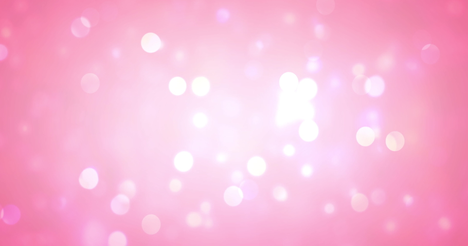 Pink Ribbon with a white lights on a pink background. Breast cancer concept. Royalty-Free Stock Footage #1052883260
