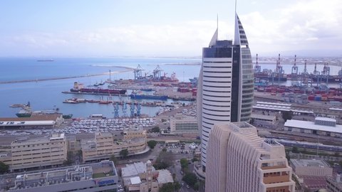 HAIFA, ISRAEL - April 5, 2020: View from above on the downtown area of Haifa Israel. Haifa Port Area and famous ״TIL" Building.