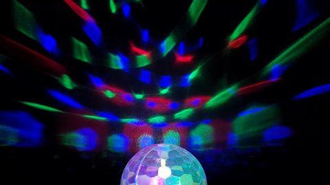 Disco Light.Rotating disc light.Disco ball.multicolored neon lights.color footage 4K.