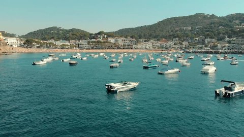 Spain Costa Brava Mediterranean coastline panning from the sea shore, Canyelles Grosses, Roses, Catalonia