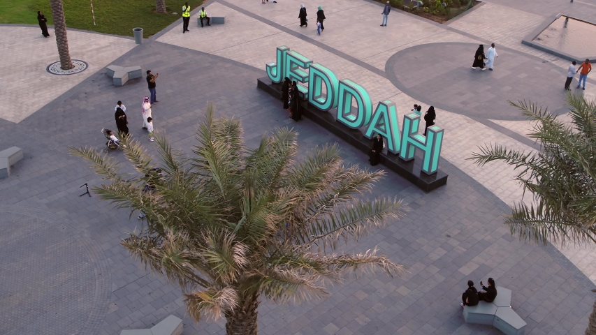 Drone shot of Jeddah Landmark at Corniche with people around it Royalty-Free Stock Footage #1052905655