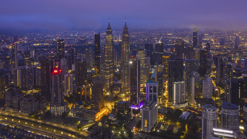 Night time view of Petronas Twin Towers in Kuala Lumpur, Malaysia image ...