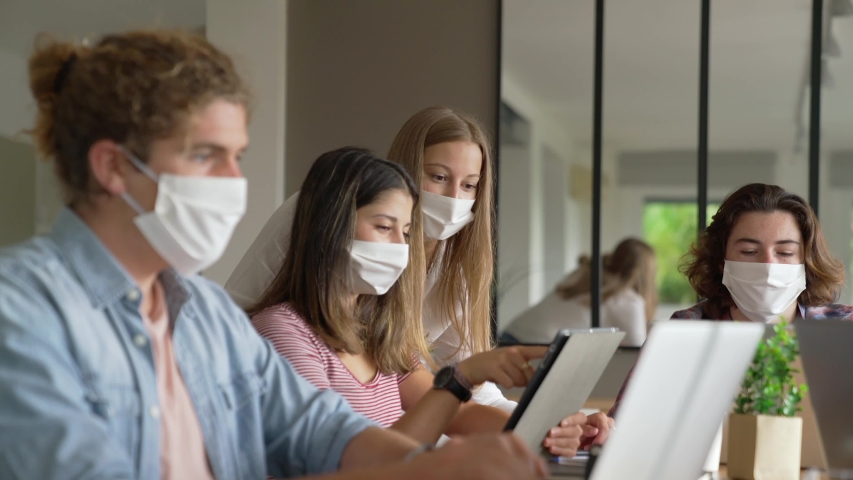 group of students working wearing masks Royalty-Free Stock Footage #1052932238