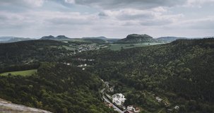 4k moving Timelapse Video clip towards elbe river and Lilienstein in saxon switzerland from fortress koenigstein. Aerial village view in Saxony region in Germany.