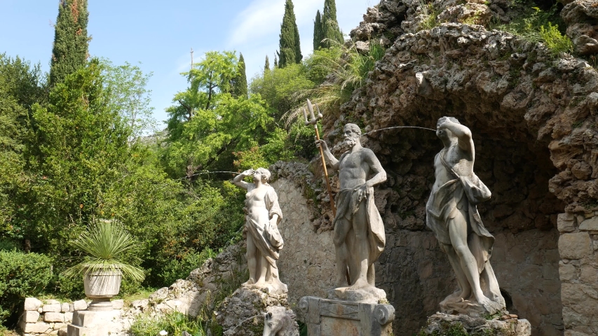 Old stone fountain in the botanical garden Trsteno, near Dubrovnik, Croatia. Statue of Neptune,  Film location