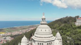 AERIAL DRONE FOOTAGE - The Monument Temple of Santa Luzia, dedicated to the Sacred Heart of Jesus in Viana do Castelo, Portugal. Its imposing rose windows are the largest in the Iberian Peninsula.
