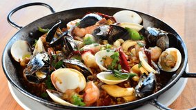 Paella, celebrated Spanish food in 4k video