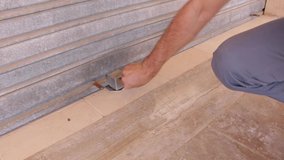 Seller closing the blind of his business due to the crisis. COVID-19 recession - Powered by Shutterstock - Get 15% off with code: PIKWIZARD15