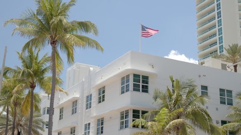 6k video buildings and palm trees with American Flag Miami Fort Lauderdale scene