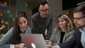 Colleagues And Clients Talking Strategy With Laptop And Tablet. In Creative Office Productive Coworkers Standing At The Table For Company Meeting. Teamwork And Scial Concepts - Powered by Shutterstock - Get 15% off with code: PIKWIZARD15