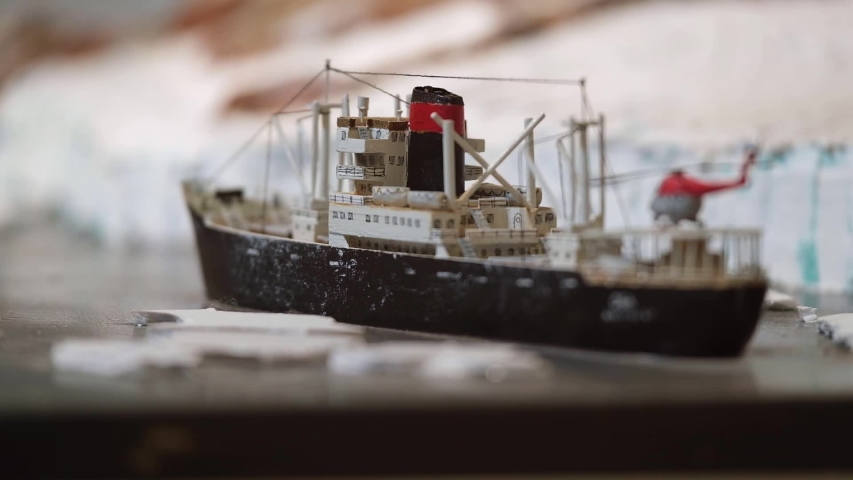 A macro model of icebreaker with a helicopter in North Pole