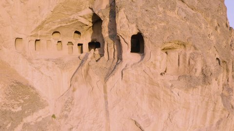 Close up of an ancient cliff homes at Cappadocia, Turkey. Old stone houses.
