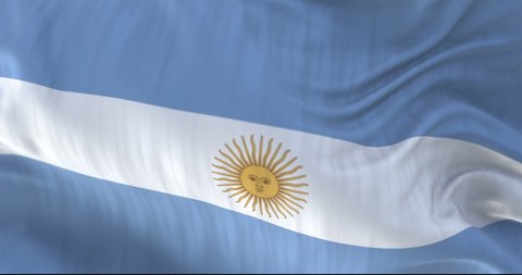 Argentina flag close up view is blowing in the wind in slow motion. 10 seconds loopable footage.